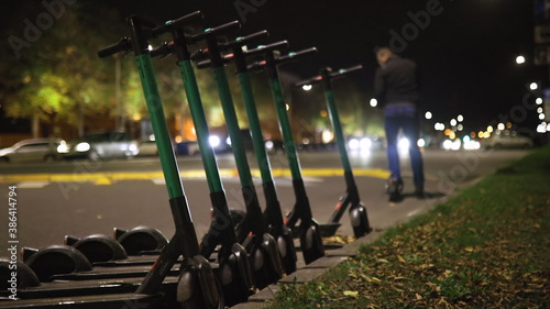 Man rents electric scooter and rides away at night