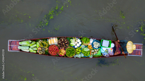 Photography Aerial view famous floating market in Thailand, Damnoen Saduak floating market,