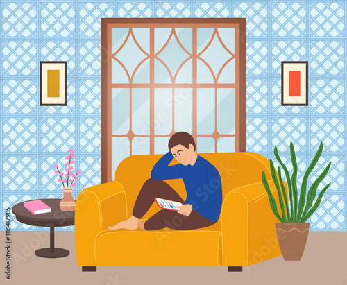 Man sitting on the sofa at home and correspondence surfing the Internet. Male character communicating through network on the tablet. Social media network communication digital gadget addiction