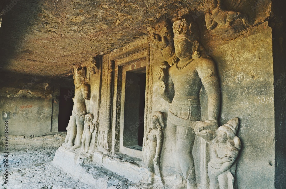Fototapeta premium stone carving and Sculptures at Ellora caves ,UNESCO world heritage site near Aurangabad, Maharashtra, India