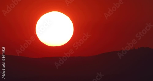 Sunset telephoto footage from long distance