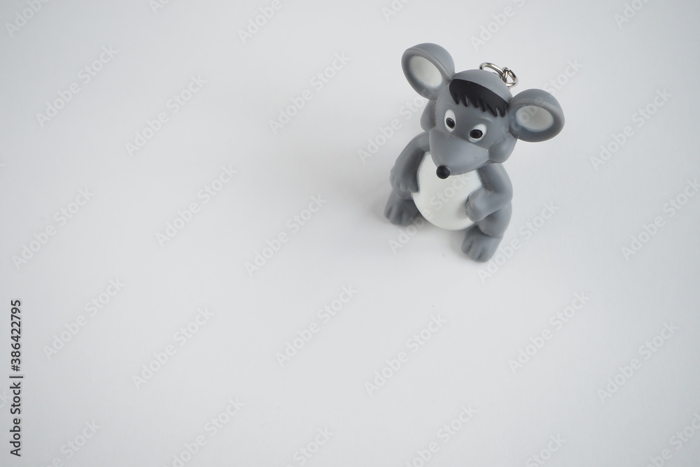 Children's toy mouse on a white background. Symbol of Children's toy mouse on a white background. Symbol of