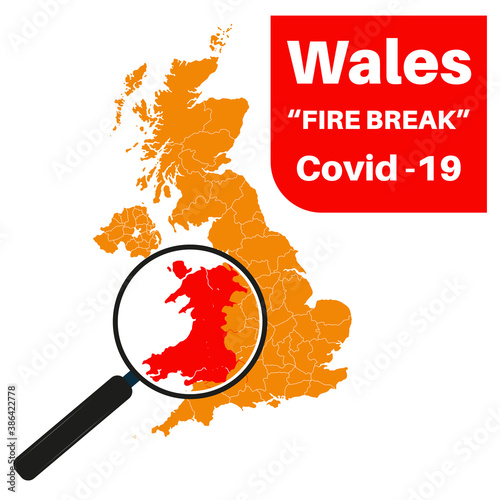 Fototapeta Wales Covid-19 Fire Break with map and magnifying glass