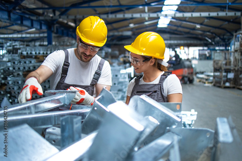 Factory workers working in production line. photo