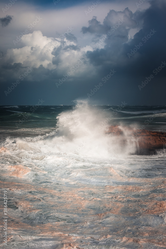 Sea storm with really big waves hitting the coast of Biarritz, at the Basque Country.