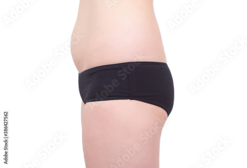 Woman's buttocks, belly and hips on a white background. Woman flat figure, buttock augmentation, plastic surgery, isolate