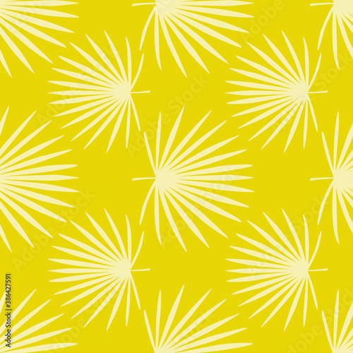 Bright seamless doodle pattern with creative fan palm leafs ornament design. Light foliage tropic silhouettes on yellow background.