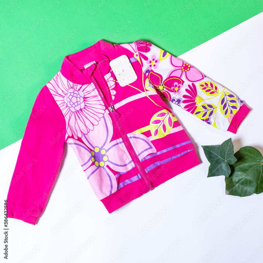 Baby girl colorful clothes and toy stuff, baby fashion concept jacket Baby girl colorful clothes and toy stuff, baby fashion concept jacket