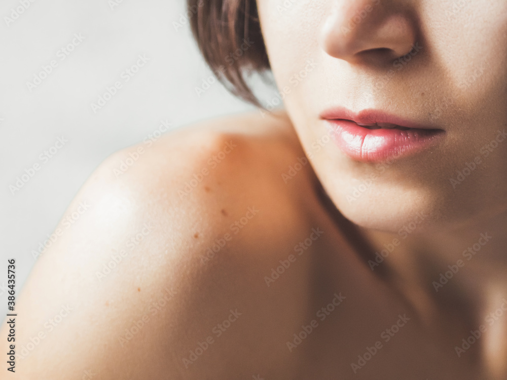 Close up portrait of woman on white background. Natural beauty without make up. Close up portrait of woman on white background. Natural beauty without make up.