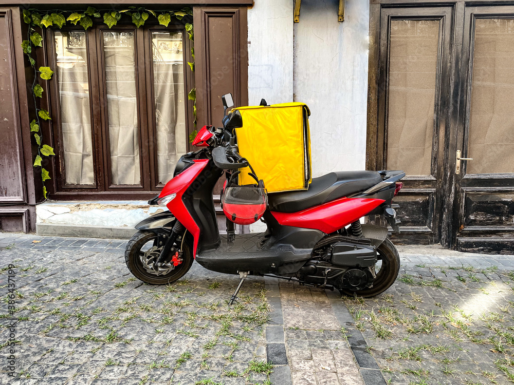 Fast and free delivery food by scooter in the city