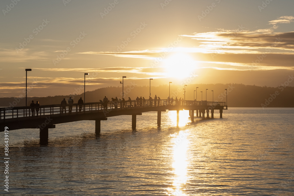 Fishermen on Pier During Beautiful Sunset