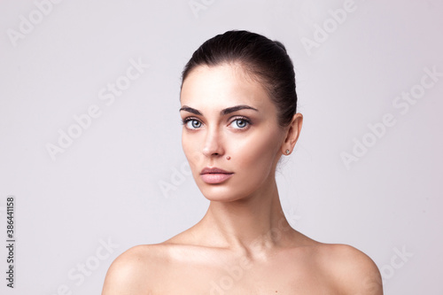 closeup portrait of beautyful woman with clean fresh skin