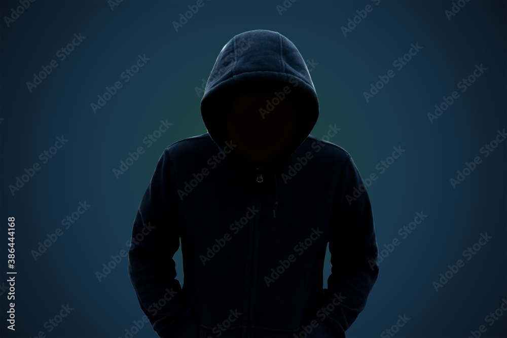 A hooded man with no face: concept of suspicion in person, theft A hooded man with no face: concept of suspicion in person, theft