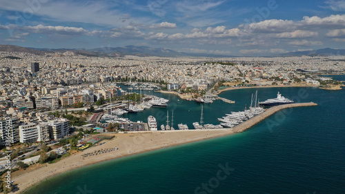 Aerial drone panoramic photo of iconic round port and marina of Zea in the heart of Piraeus with beautiful sky and clouds, Attica, Greece © aerial-drone