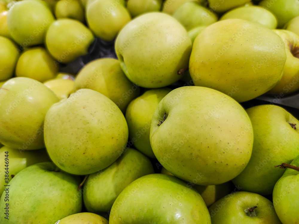 focus on Group of golden apples sold on a market focus on Group of golden apples sold on a market