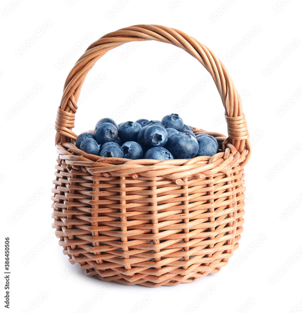 Fresh tasty blueberries in wicker basket isolated on white Fresh tasty blueberries in wicker basket isolated on white