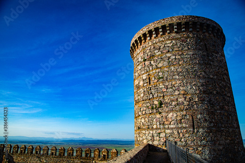 Round castle tower with deep blue background background