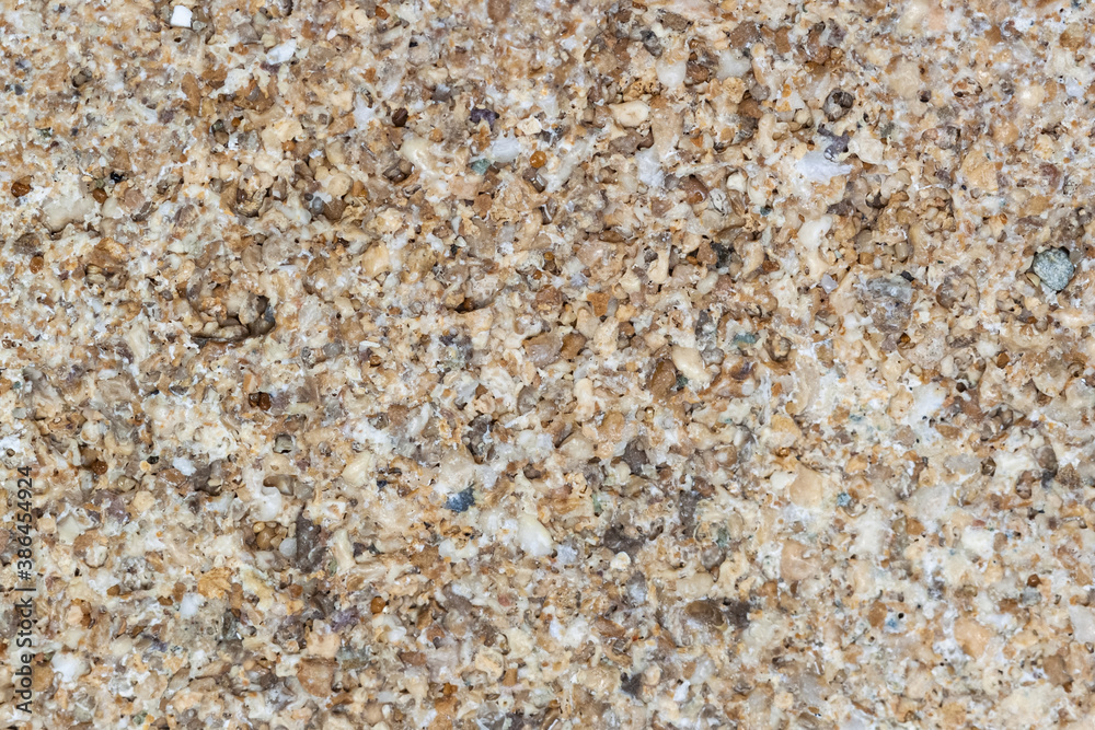 Sea ocean stone closeup macro texture pattern with tiny different sizes broken pebbles above view Sea ocean stone closeup macro texture pattern with tiny different sizes broken pebbles above view