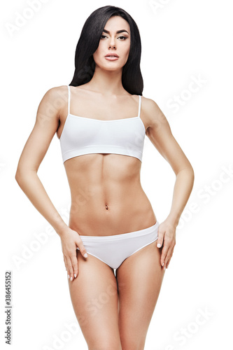 Fitness young woman with a beautiful body
