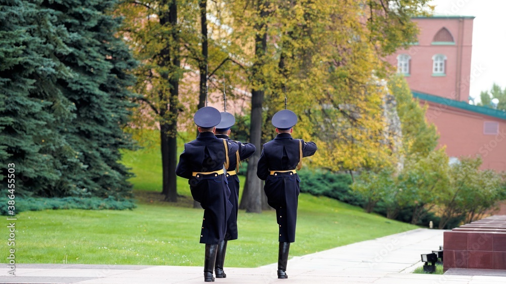 Guard of honor in Alexander garden around Unknown Solder Grave near Kremlin wall in autumn time Guard of honor in Alexander garden around Unknown Solder Grave near Kremlin wall in autumn time