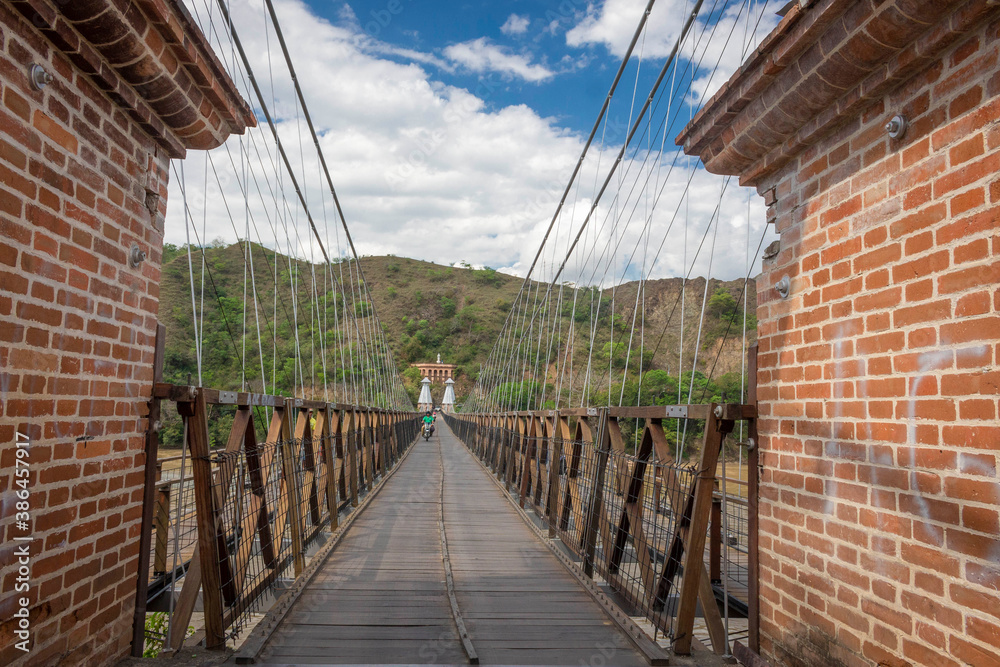 Obraz premium Santa Fe de Antioquia / Colombia - January 21, 2018. Puente de Occidente (Western Bridge) in Santa Fe de Antioquia, Colombia