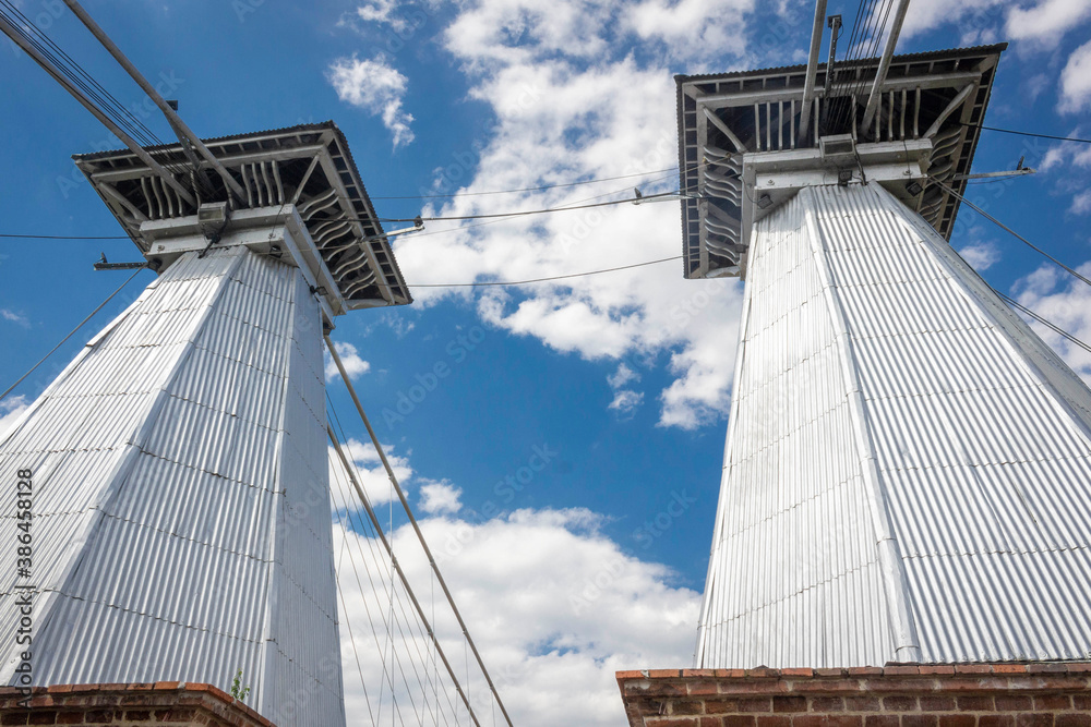 Obraz premium Santa Fe de Antioquia / Colombia - January 21, 2018. Puente de Occidente (Western Bridge) in Santa Fe de Antioquia, Colombia