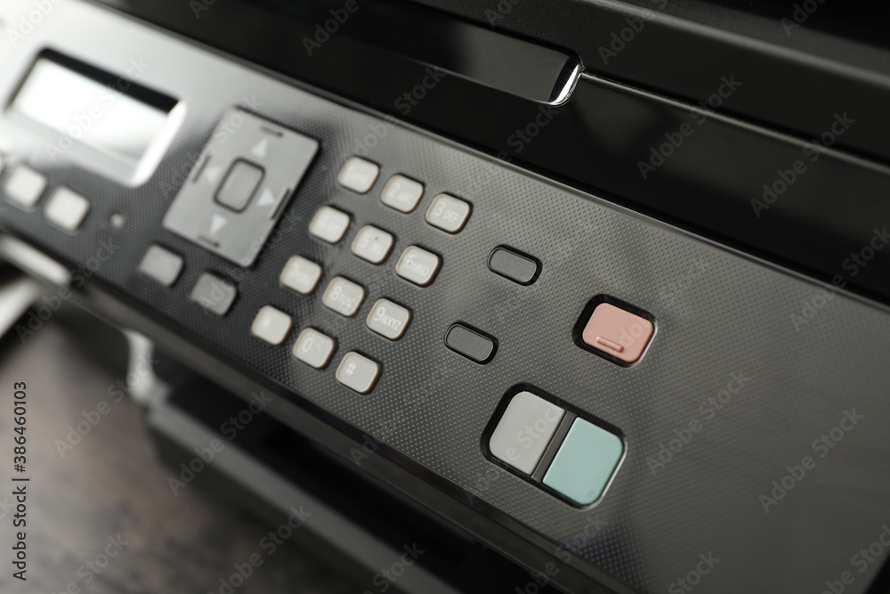 Closeup view of new modern printer on table Closeup view of new modern printer on table