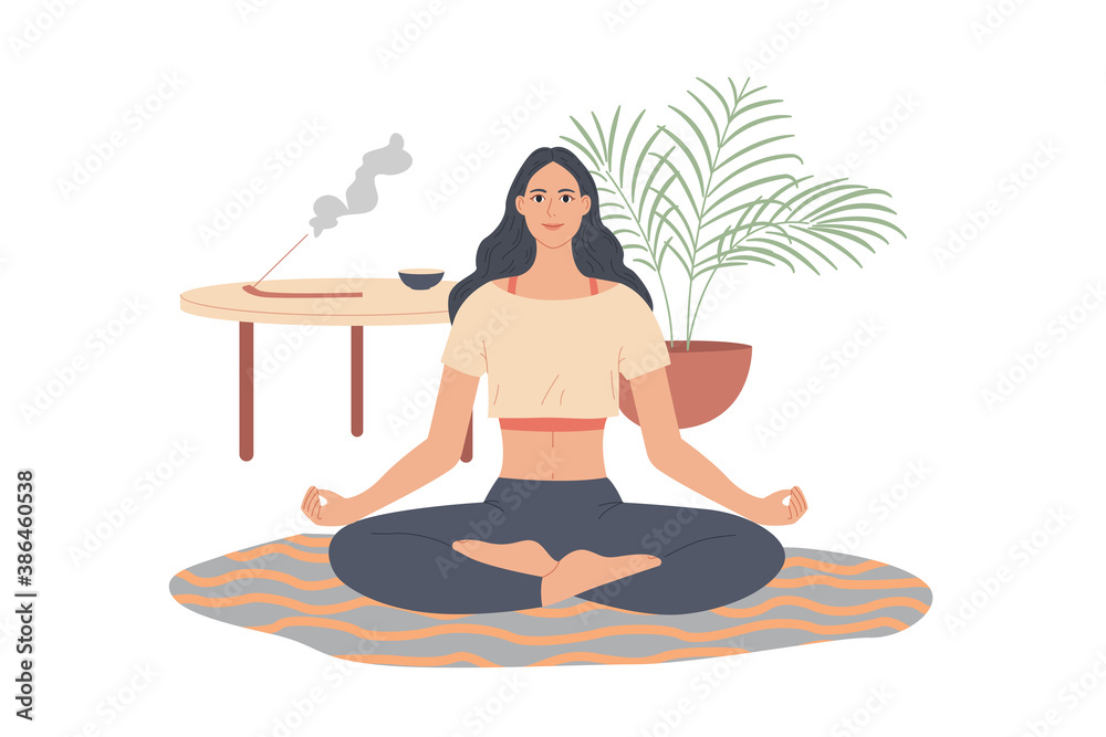 Woman sitting in yoga pose at home. Girl doing meditation in living room