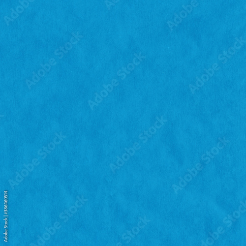 Blue vintage and old looking crumpled paper background. Retro cardboard texture. Grunge paper for drawing. Ancient book page. Present wrapping.