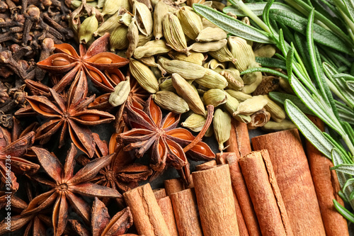 Fototapeta Naklejka Na Ścianę i Meble -  Different mulled wine ingredients as background, closeup