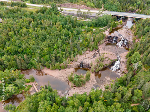 Aerial View of Gooseberry Falls, MN Showing Waterfalls, Fir Trees and Bridge on Summer Day. photo