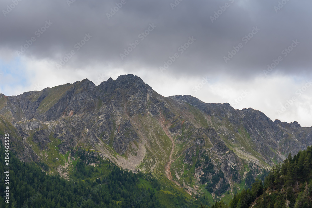 edgy mountains with rainclouds in the mountains edgy mountains with rainclouds in the mountains