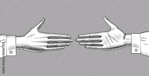 Two hands reach out towards each other. Vintage engraving stylized drawing