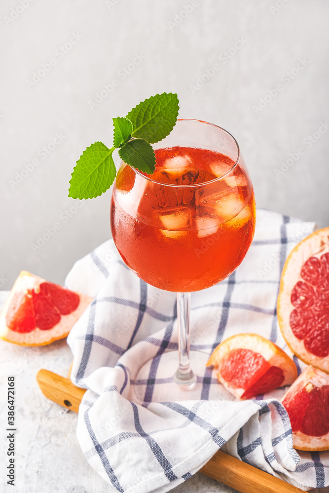 Alcohol Aperol drink with grapefruit in glass Alcohol Aperol drink with grapefruit in glass