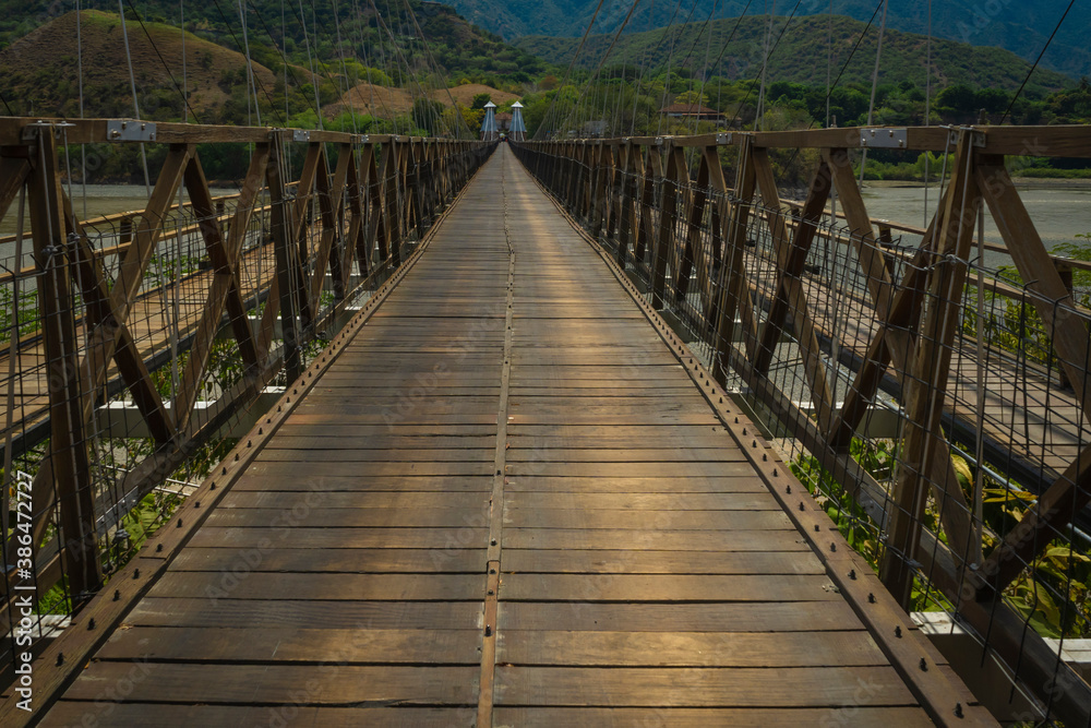 Obraz premium Santa Fe de Antioquia / Colombia - January 21, 2018. Puente de Occidente (Western Bridge) in Santa Fe de Antioquia, Colombia