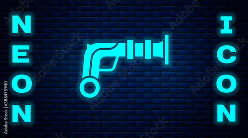 Glowing neon Vintage pistols icon isolated on brick wall background. Ancient weapon. Vector.