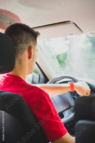 Photos Man driving a car