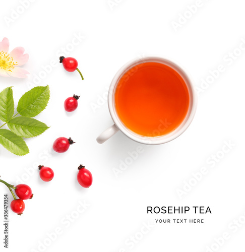 Creative layout made of cup of rose hip tea on white background. Flat lay. Food concept.