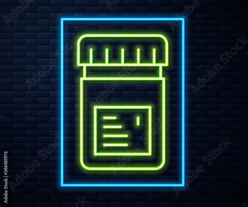 Glowing neon line Biologically active additives icon isolated on brick wall background. Vector.