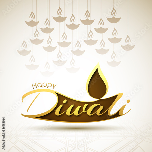 Happy Diwali greeting card with intricate calligraphy and illuminated Diwali lamp.