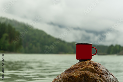 Photography Mug on the background of mountains