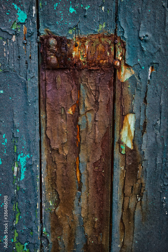 Coloured Cracked Paint on an Old Teal Door