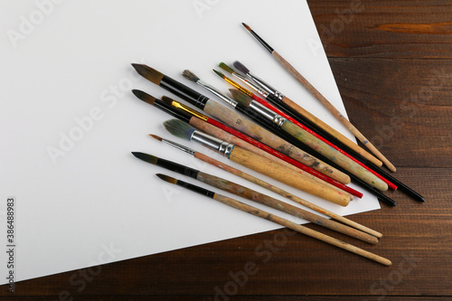 background of art brushes and paper