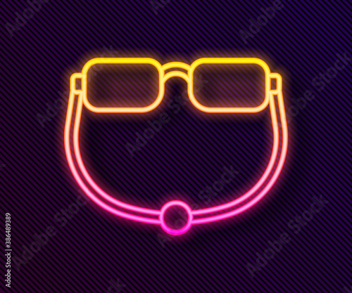 Glowing neon line Eyeglasses icon isolated on black background. Vector.