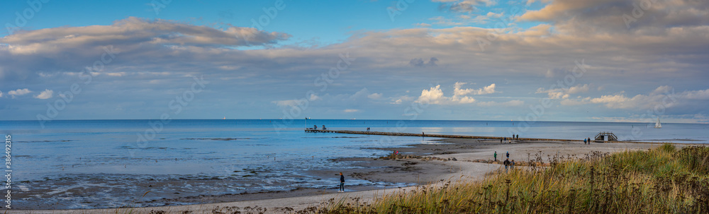 Beach hike in Laboe, Schleswig-Holstein, Germany, on a sunny autumn day