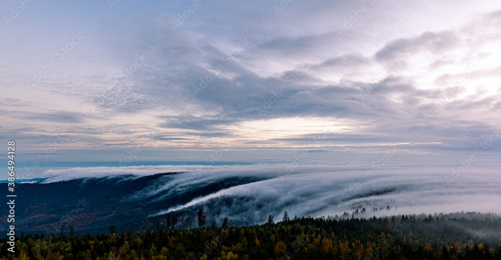 Moving clouds and autumn fog over the Black Forest