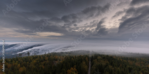 Moving clouds and autumn fog over the Black Forest