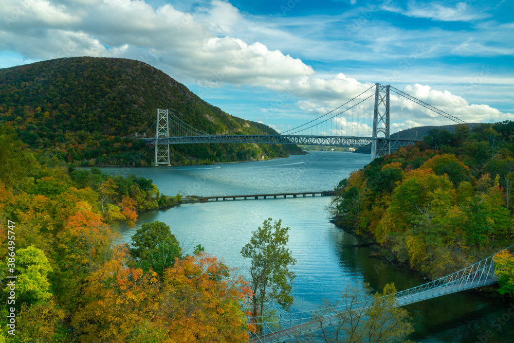 Fort Montgomery, NY / USA -Oct. 18, 2020: a wide angle view of the iconic Bear Mountain Bridge spanning the Hudson River. - obrazy, fototapety, plakaty 