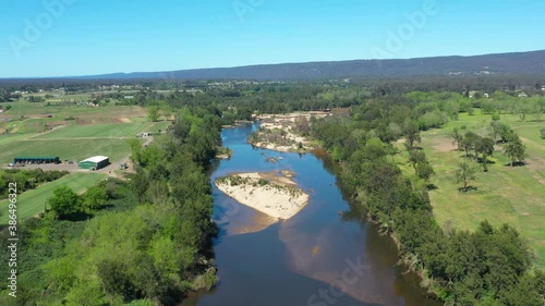 Wallpaper Mural Aerial footage of the Hawkesbury River running through agricultural fields in regional New South Wales in Australia Torontodigital.ca