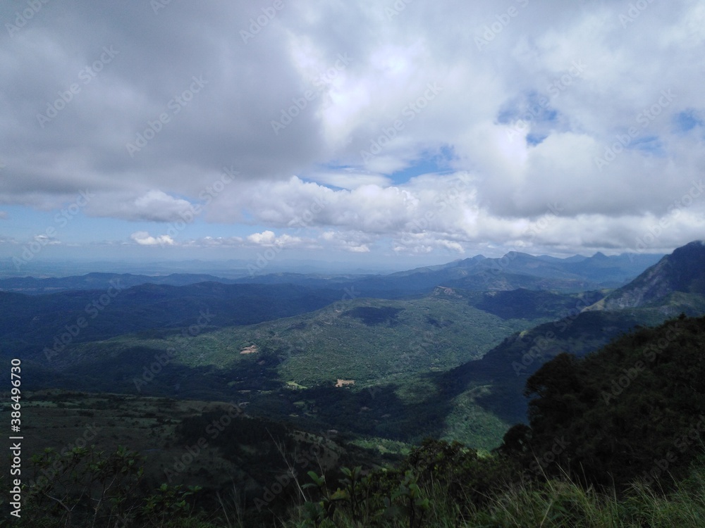 Naklejka premium clouds over the mountains